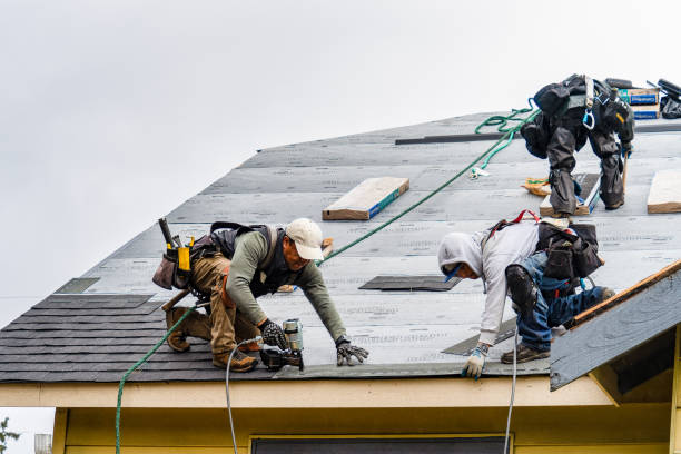 Professional Roofing technician working in Pennville, PA
